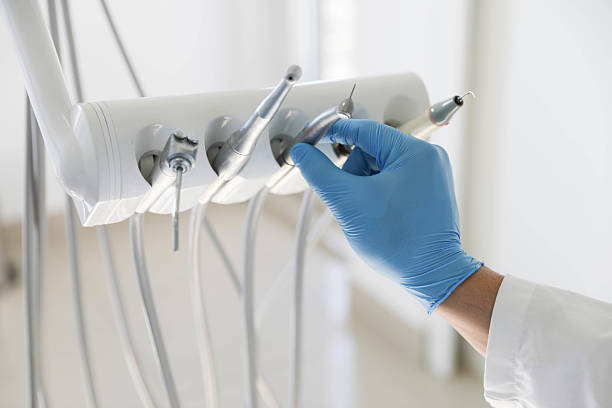 Professional Tooth Extraction technician working in Union County County, AR